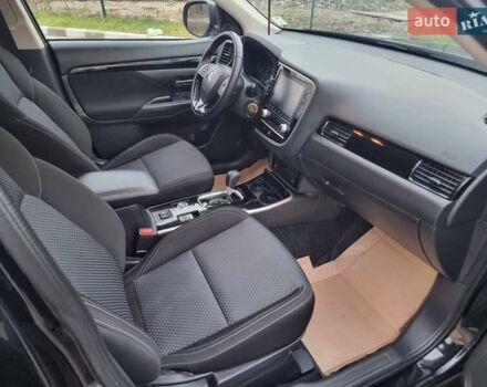 Черный Мицубиси Аутлендер, объемом двигателя 2.36 л и пробегом 127 тыс. км за 20800 $, фото 45 на Automoto.ua