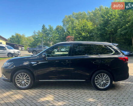Чорний Міцубісі Аутлендер, об'ємом двигуна 2.36 л та пробігом 174 тис. км за 27800 $, фото 3 на Automoto.ua