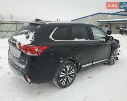 Черный Мицубиси Аутлендер, объемом двигателя 2.36 л и пробегом 84 тыс. км за 3000 $, фото 2 на Automoto.ua