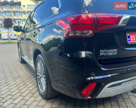 Чорний Міцубісі Аутлендер, об'ємом двигуна 2.36 л та пробігом 174 тис. км за 27800 $, фото 10 на Automoto.ua