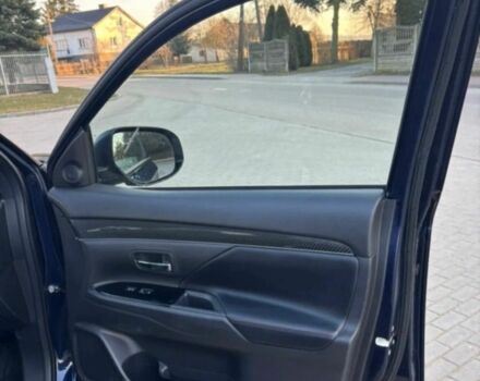 Черный Мицубиси Аутлендер, объемом двигателя 2.4 л и пробегом 38 тыс. км за 14000 $, фото 1 на Automoto.ua