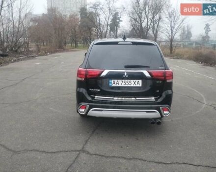 Черный Мицубиси Аутлендер, объемом двигателя 2.4 л и пробегом 81 тыс. км за 20900 $, фото 3 на Automoto.ua