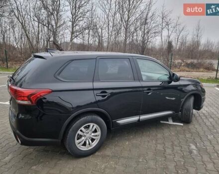 Черный Мицубиси Аутлендер, объемом двигателя 2.36 л и пробегом 127 тыс. км за 20800 $, фото 7 на Automoto.ua