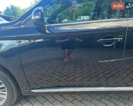 Чорний Міцубісі Аутлендер, об'ємом двигуна 2.36 л та пробігом 174 тис. км за 27800 $, фото 14 на Automoto.ua