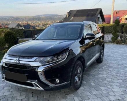 Черный Мицубиси Аутлендер, объемом двигателя 2.4 л и пробегом 1 тыс. км за 14400 $, фото 3 на Automoto.ua