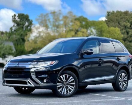 Черный Мицубиси Аутлендер, объемом двигателя 2.4 л и пробегом 46 тыс. км за 3000 $, фото 2 на Automoto.ua