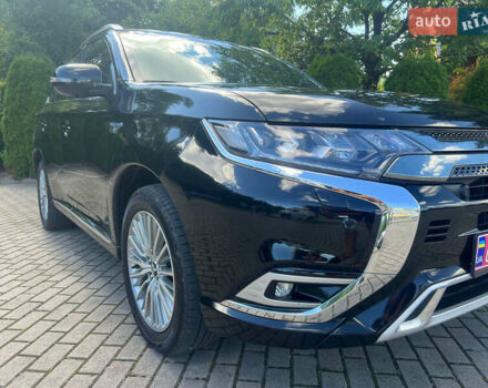 Чорний Міцубісі Аутлендер, об'ємом двигуна 2.36 л та пробігом 174 тис. км за 27800 $, фото 11 на Automoto.ua