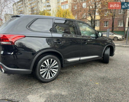 Черный Мицубиси Аутлендер, объемом двигателя 2.4 л и пробегом 44 тыс. км за 18700 $, фото 2 на Automoto.ua