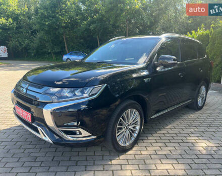 Чорний Міцубісі Аутлендер, об'ємом двигуна 2.36 л та пробігом 174 тис. км за 27800 $, фото 2 на Automoto.ua