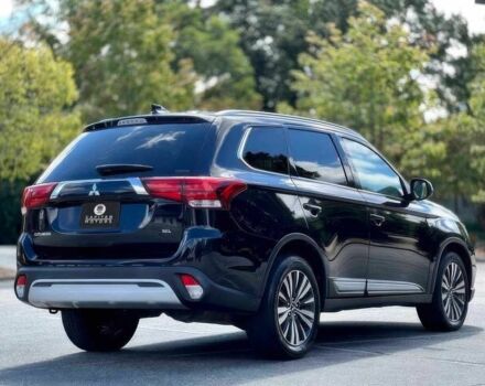 Черный Мицубиси Аутлендер, объемом двигателя 2.4 л и пробегом 46 тыс. км за 3000 $, фото 6 на Automoto.ua