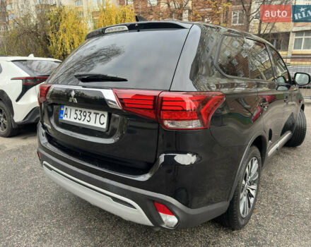 Черный Мицубиси Аутлендер, объемом двигателя 2.4 л и пробегом 44 тыс. км за 18700 $, фото 3 на Automoto.ua