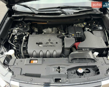 Черный Мицубиси Аутлендер, объемом двигателя 2.4 л и пробегом 44 тыс. км за 18700 $, фото 20 на Automoto.ua