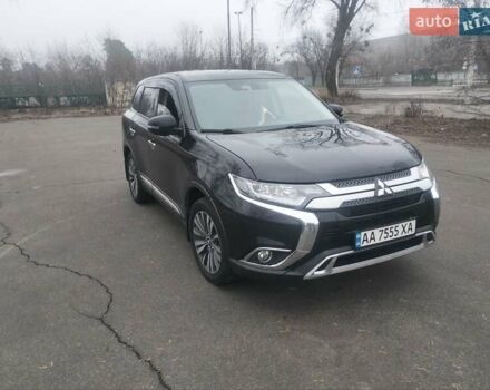 Черный Мицубиси Аутлендер, объемом двигателя 2.4 л и пробегом 81 тыс. км за 20900 $, фото 1 на Automoto.ua