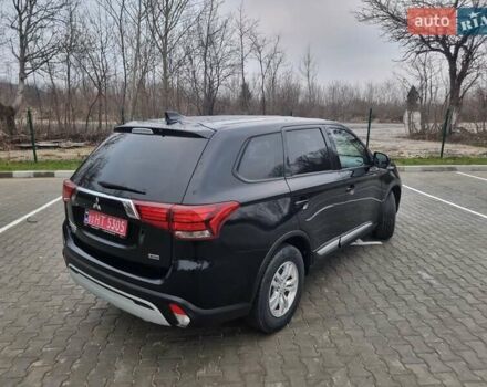 Черный Мицубиси Аутлендер, объемом двигателя 2.36 л и пробегом 127 тыс. км за 20800 $, фото 5 на Automoto.ua