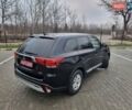 Черный Мицубиси Аутлендер, объемом двигателя 2.36 л и пробегом 127 тыс. км за 20800 $, фото 5 на Automoto.ua