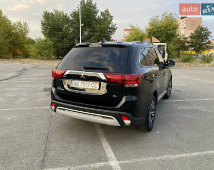 Черный Мицубиси Аутлендер, объемом двигателя 2.36 л и пробегом 39 тыс. км за 22800 $, фото 4 на Automoto.ua