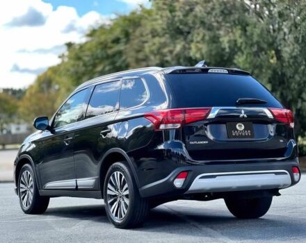 Черный Мицубиси Аутлендер, объемом двигателя 2.4 л и пробегом 46 тыс. км за 3000 $, фото 4 на Automoto.ua