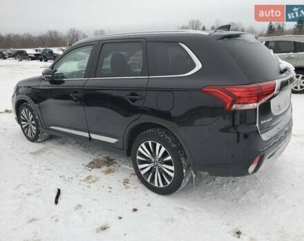 Черный Мицубиси Аутлендер, объемом двигателя 2.36 л и пробегом 84 тыс. км за 3000 $, фото 1 на Automoto.ua