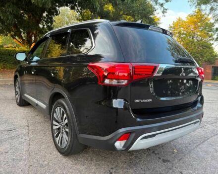 Черный Мицубиси Аутлендер, объемом двигателя 2.4 л и пробегом 49 тыс. км за 12400 $, фото 4 на Automoto.ua