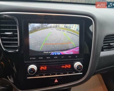 Черный Мицубиси Аутлендер, объемом двигателя 2.36 л и пробегом 127 тыс. км за 20800 $, фото 28 на Automoto.ua