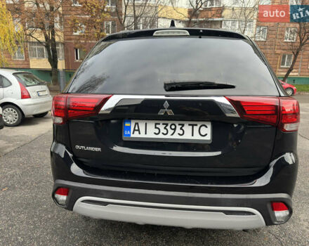 Черный Мицубиси Аутлендер, объемом двигателя 2.4 л и пробегом 44 тыс. км за 18700 $, фото 4 на Automoto.ua
