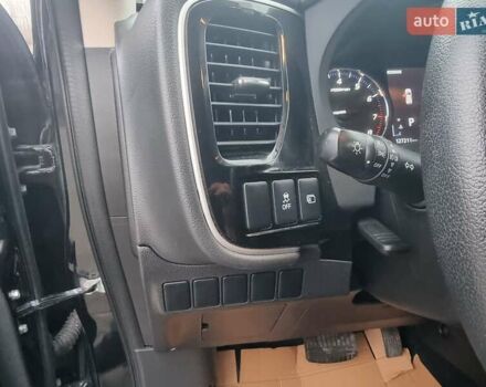 Черный Мицубиси Аутлендер, объемом двигателя 2.36 л и пробегом 127 тыс. км за 20800 $, фото 23 на Automoto.ua