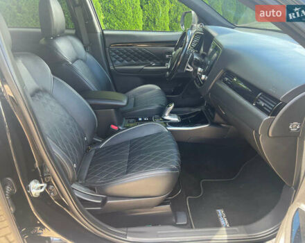 Чорний Міцубісі Аутлендер, об'ємом двигуна 2.36 л та пробігом 174 тис. км за 27800 $, фото 32 на Automoto.ua