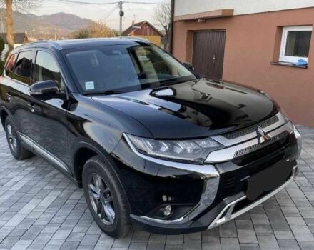 Черный Мицубиси Аутлендер, объемом двигателя 2.4 л и пробегом 1 тыс. км за 14400 $, фото 2 на Automoto.ua