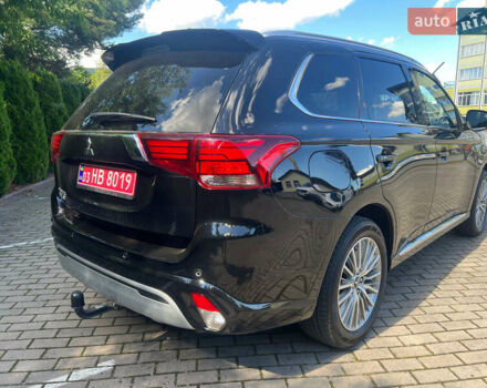 Чорний Міцубісі Аутлендер, об'ємом двигуна 2.36 л та пробігом 174 тис. км за 27800 $, фото 6 на Automoto.ua