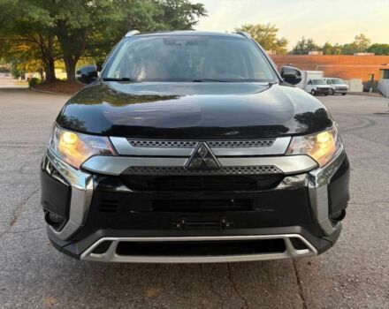 Черный Мицубиси Аутлендер, объемом двигателя 2.4 л и пробегом 49 тыс. км за 12400 $, фото 1 на Automoto.ua