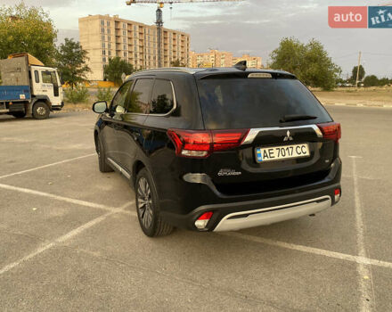 Черный Мицубиси Аутлендер, объемом двигателя 2.36 л и пробегом 39 тыс. км за 22800 $, фото 3 на Automoto.ua