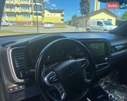 Чорний Міцубісі Аутлендер, об'ємом двигуна 2.36 л та пробігом 174 тис. км за 27800 $, фото 36 на Automoto.ua