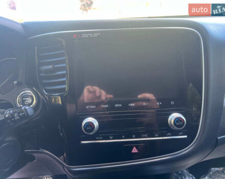 Чорний Міцубісі Аутлендер, об'ємом двигуна 2.36 л та пробігом 174 тис. км за 27800 $, фото 38 на Automoto.ua