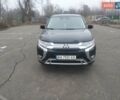 Черный Мицубиси Аутлендер, объемом двигателя 2.4 л и пробегом 81 тыс. км за 20900 $, фото 1 на Automoto.ua