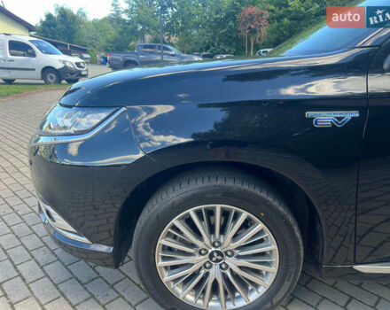 Чорний Міцубісі Аутлендер, об'ємом двигуна 2.36 л та пробігом 174 тис. км за 27800 $, фото 13 на Automoto.ua