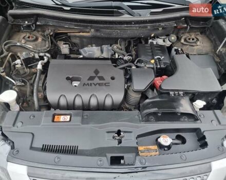 Черный Мицубиси Аутлендер, объемом двигателя 2.36 л и пробегом 127 тыс. км за 20800 $, фото 48 на Automoto.ua