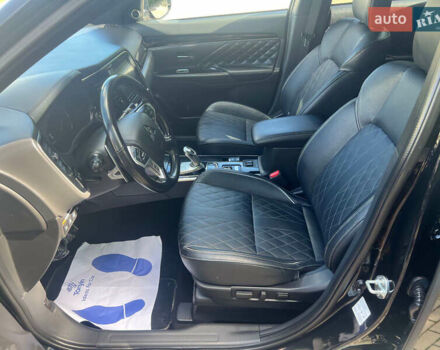 Чорний Міцубісі Аутлендер, об'ємом двигуна 2.36 л та пробігом 174 тис. км за 27800 $, фото 26 на Automoto.ua