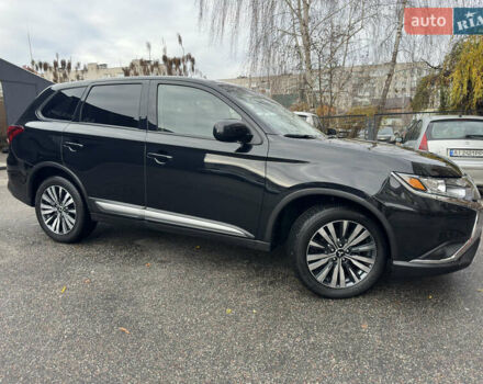 Черный Мицубиси Аутлендер, объемом двигателя 2.4 л и пробегом 44 тыс. км за 18700 $, фото 1 на Automoto.ua