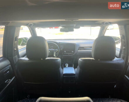 Чорний Міцубісі Аутлендер, об'ємом двигуна 2.36 л та пробігом 174 тис. км за 27800 $, фото 43 на Automoto.ua