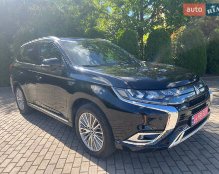 Чорний Міцубісі Аутлендер, об'ємом двигуна 2.36 л та пробігом 174 тис. км за 27800 $, фото 1 на Automoto.ua