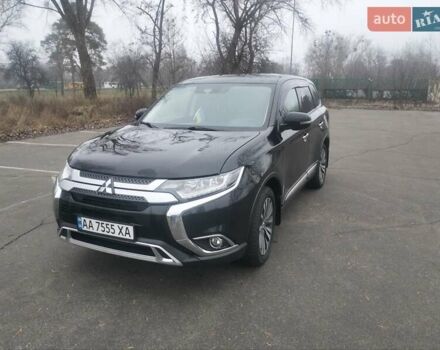 Черный Мицубиси Аутлендер, объемом двигателя 2.4 л и пробегом 81 тыс. км за 20900 $, фото 2 на Automoto.ua