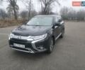 Черный Мицубиси Аутлендер, объемом двигателя 2.4 л и пробегом 81 тыс. км за 20900 $, фото 2 на Automoto.ua