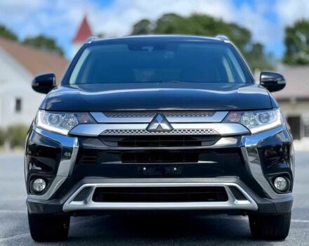 Черный Мицубиси Аутлендер, объемом двигателя 2.4 л и пробегом 46 тыс. км за 3000 $, фото 1 на Automoto.ua