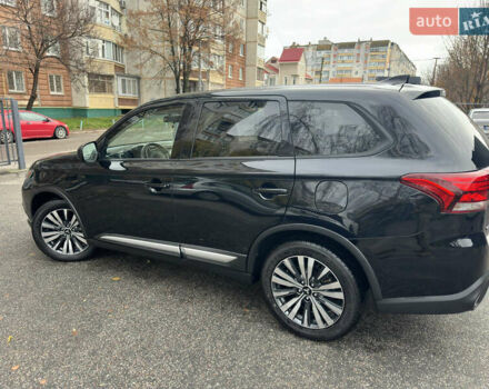 Черный Мицубиси Аутлендер, объемом двигателя 2.4 л и пробегом 44 тыс. км за 18700 $, фото 6 на Automoto.ua