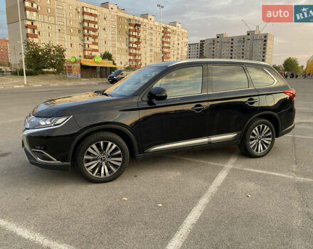 Черный Мицубиси Аутлендер, объемом двигателя 2.36 л и пробегом 39 тыс. км за 22800 $, фото 2 на Automoto.ua