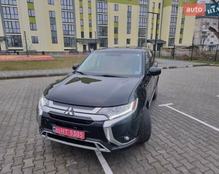 Черный Мицубиси Аутлендер, объемом двигателя 2.36 л и пробегом 127 тыс. км за 20800 $, фото 3 на Automoto.ua