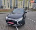 Черный Мицубиси Аутлендер, объемом двигателя 2.36 л и пробегом 127 тыс. км за 20800 $, фото 3 на Automoto.ua
