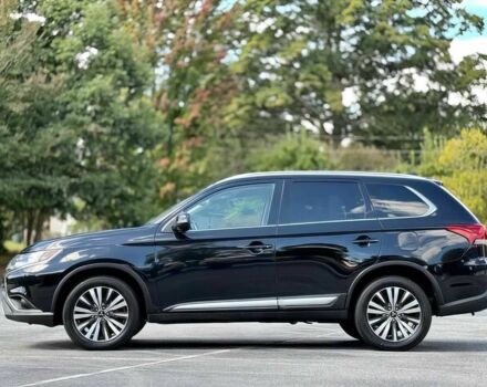 Черный Мицубиси Аутлендер, объемом двигателя 2.4 л и пробегом 46 тыс. км за 3000 $, фото 3 на Automoto.ua