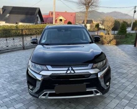 Черный Мицубиси Аутлендер, объемом двигателя 2.4 л и пробегом 1 тыс. км за 14400 $, фото 1 на Automoto.ua