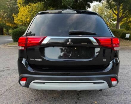 Черный Мицубиси Аутлендер, объемом двигателя 2.4 л и пробегом 49 тыс. км за 12400 $, фото 5 на Automoto.ua